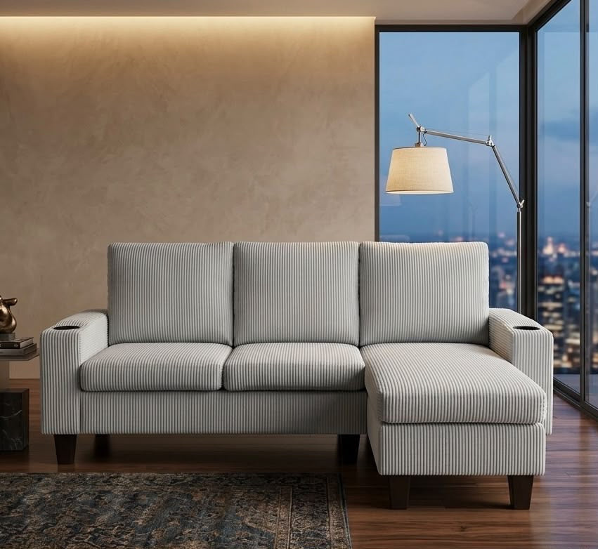 Light grey corduroy 3-seater couch with switchable ottoman and cup holders