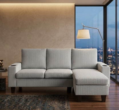 Light grey corduroy 3-seater couch with switchable ottoman and cup holders